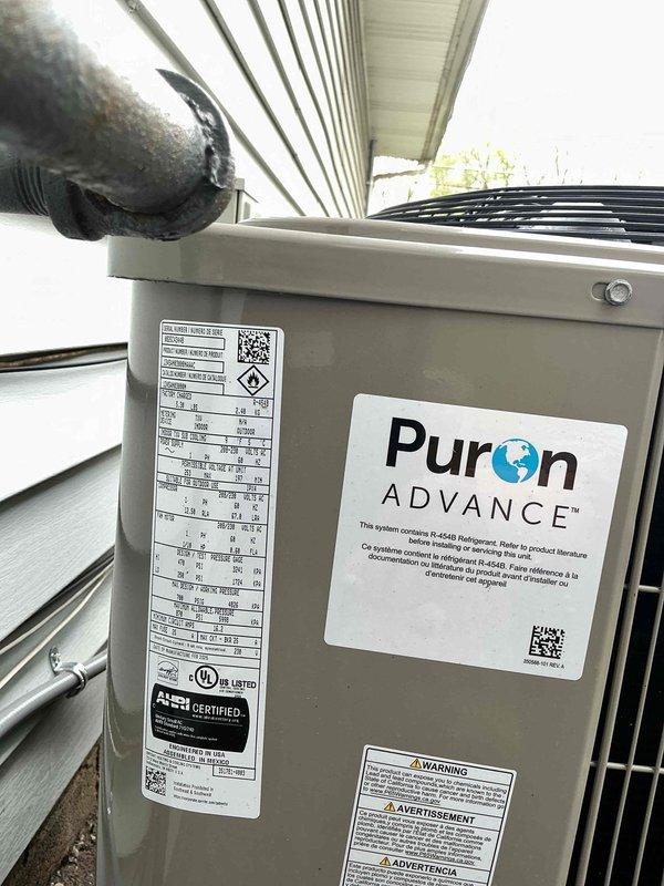 Performed system start-up on new outdoor HVAC condensing unit utilizing R-454B Puron Advance refrigerant. Unit successfully commissioned and operational, with all manufacturer labels and specifications properly affixed. System available for service between 9 AM and 5 PM with advance notification required.