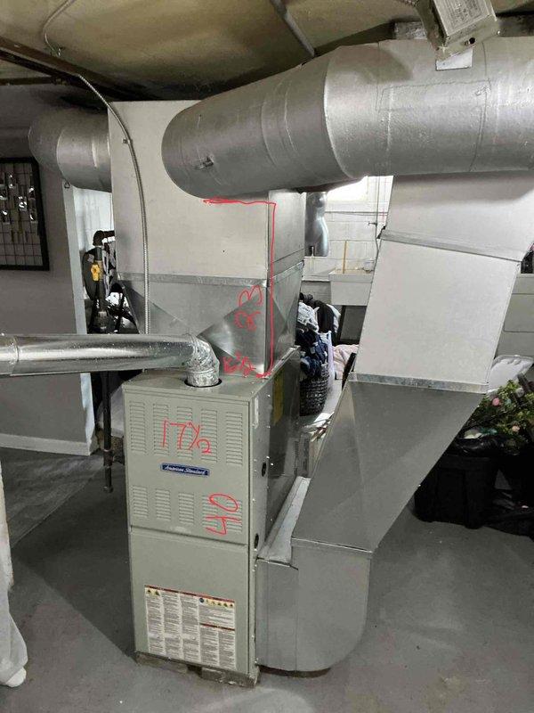 Performed on-site evaluation for air conditioning system addition to existing forced-air heating system. Assessed current furnace installation, ductwork configuration, and electrical panel capacity to determine compatibility and requirements for AC integration. Documented existing HVAC equipment specifications, supply and return duct routing, and available electrical circuits. Confirmed adequate electrical service disconnect present and verified panel capacity for additional cooling system load. Evaluated mechanical room layout and clearances for potential evaporator coil and condensing unit installation.