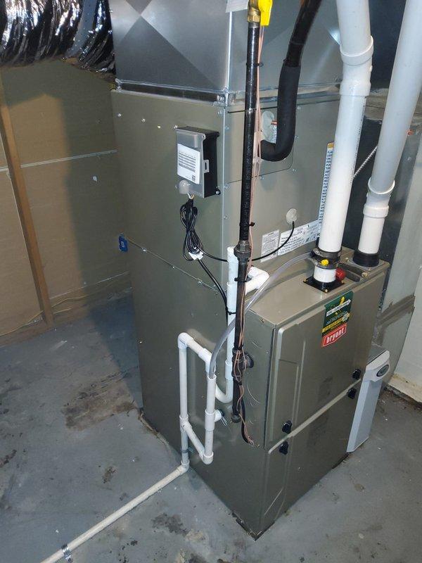 Completed full HVAC system replacement including outdoor condensing unit and indoor evaporator coil. Existing refrigerant line set was pressure tested, inspected for integrity, and reused to minimize installation time and cost. Verified proper insulation on suction line and secured copper refrigerant lines according to manufacturer specifications. Connected new equipment to existing thermostat and confirmed proper communication between components. Installed condensate drainage system with PVC piping routed to appropriate discharge location. Performed system startup, checked refrigerant charge, verified airflow across coil, and tested all operational modes to ensure proper cooling performance and efficiency.