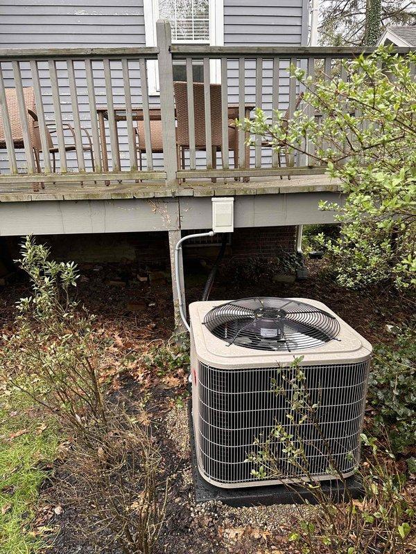 Completed full HVAC system replacement including outdoor condensing unit and indoor evaporator coil. Existing refrigerant line set was pressure tested, inspected for integrity, and reused to minimize installation time and cost. Verified proper insulation on suction line and secured copper refrigerant lines according to manufacturer specifications. Connected new equipment to existing thermostat and confirmed proper communication between components. Installed condensate drainage system with PVC piping routed to appropriate discharge location. Performed system startup, checked refrigerant charge, verified airflow across coil, and tested all operational modes to ensure proper cooling performance and efficiency.