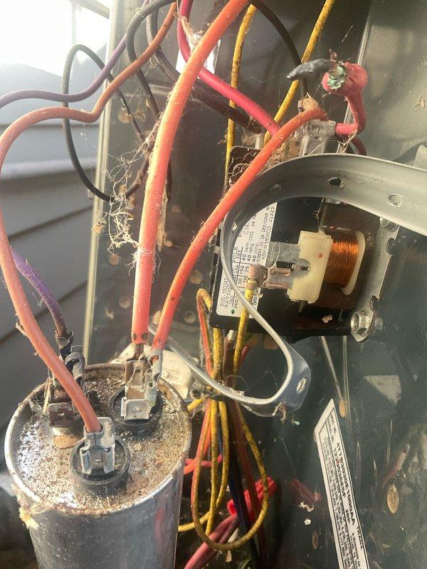 Completed preventative maintenance on residential air conditioning system. Performed thorough inspection of outdoor condensing unit and internal electrical components, including capacitor, contactor, and motor connections. Cleaned accumulated dust, debris, and cobwebs from electrical compartment and verified all wire connections were secure. System operational and running within normal parameters upon completion.