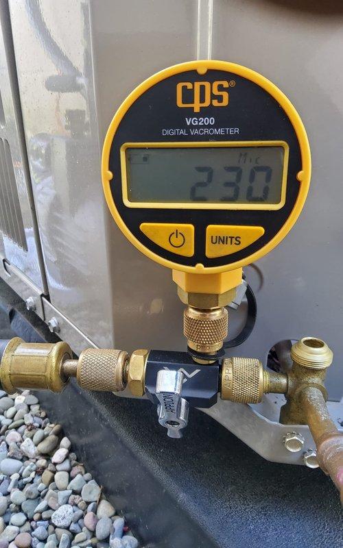 Replaced leaking filter drier using ProPress connection method to ensure secure, leak-free installation. System was evacuated to proper vacuum levels as confirmed by digital vacuometer readings, then recharged with refrigerant to manufacturer specifications.