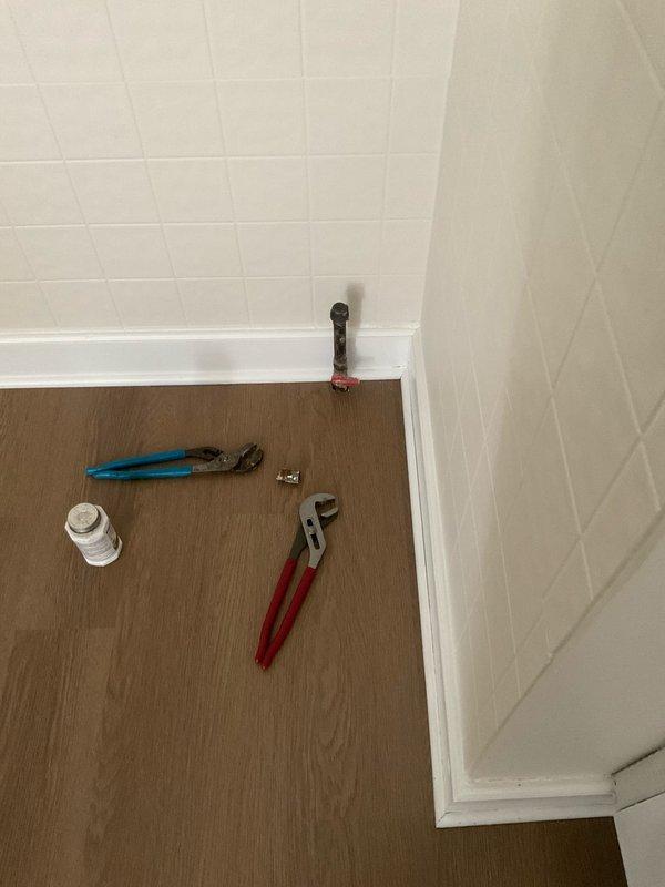 Responded to service request for gas line capping in century-old residential property. Successfully located and assessed the existing gas line, which required permanent capping to ensure safety and code compliance. Utilized appropriate pipe wrenches and hand tools to properly install a threaded gas line cap, securing the line to prevent any potential gas leaks. Completed installation per industry standards and verified seal integrity. Documented work with photographs showing tools used and the installed cap fitting.