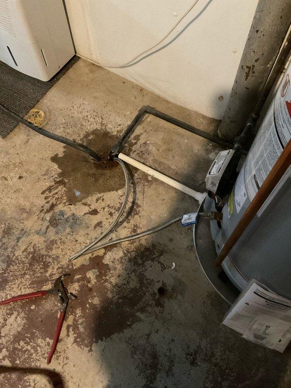 # Tanked Water Heater Flush Service

Performed routine maintenance flush on a 3-year-old residential tank-type water heater located in basement utility area. Executed complete drainage procedure to remove sediment buildup and mineral deposits from tank bottom, which helps maintain heating efficiency and extend equipment lifespan. Unit was accessible during scheduled service window and flush was completed without complications.

Upon arrival, inspected water heater installation and surrounding plumbing connections. Connected discharge hose to tank drain valve and routed to appropriate drainage area on concrete floor. Opened drain valve and allowed complete tank evacuation, flushing accumulated sediment through discharge line. Monitored water clarity during drainage process to ensure thorough removal of mineral deposits and debris. Once water ran clear, closed drain valve and restored cold water supply to refill tank.

Verified proper operation of temperature and pressure relief valve du