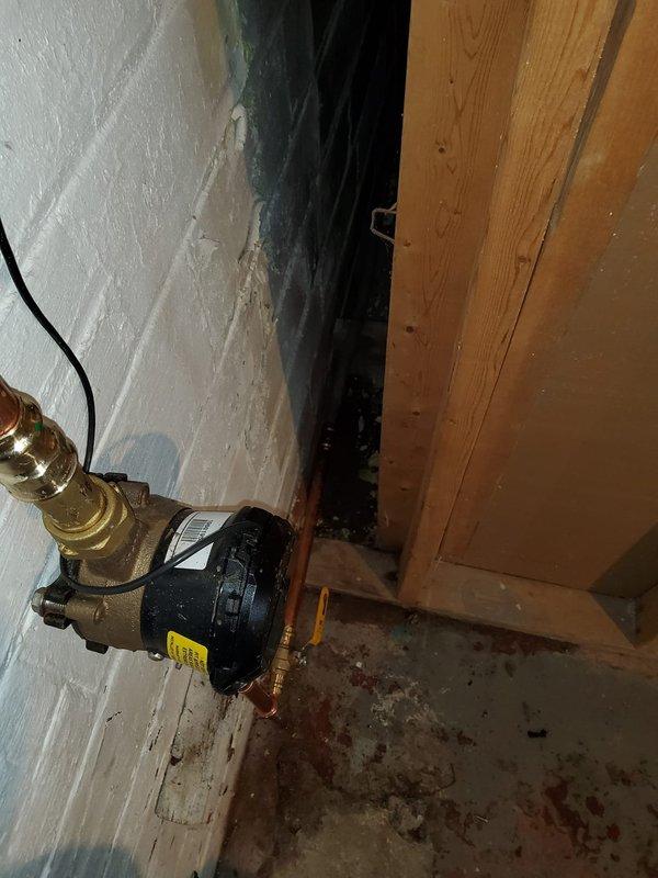 Responded to service call regarding scheduled city water shutoff. Removed all existing shark bite fittings above and below the water meter, along with a leaking elbow fitting. Replaced faulty pressure reducing valve and main water valve assembly. Installed new 3/4-inch brass water main interior shutoff valve on interior plumbing system. Tested valve operation to ensure proper functionality and inspected all connections for leaks. All copper piping connections secured and system restored to full operation upon confirmation of city water service restoration.