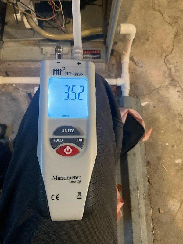 Completed comprehensive maintenance on 15-year-old gas furnace. Performed system diagnostics including gas pressure testing, measuring manifold pressure at 5.5" W.C. and inlet pressure at 35.2" W.C., confirming proper gas valve operation and fuel delivery within manufacturer specifications. Inspected all safety controls, cleaned burner assembly, checked heat exchanger for cracks, verified proper venting, and tested all system components for optimal performance and safe operation.