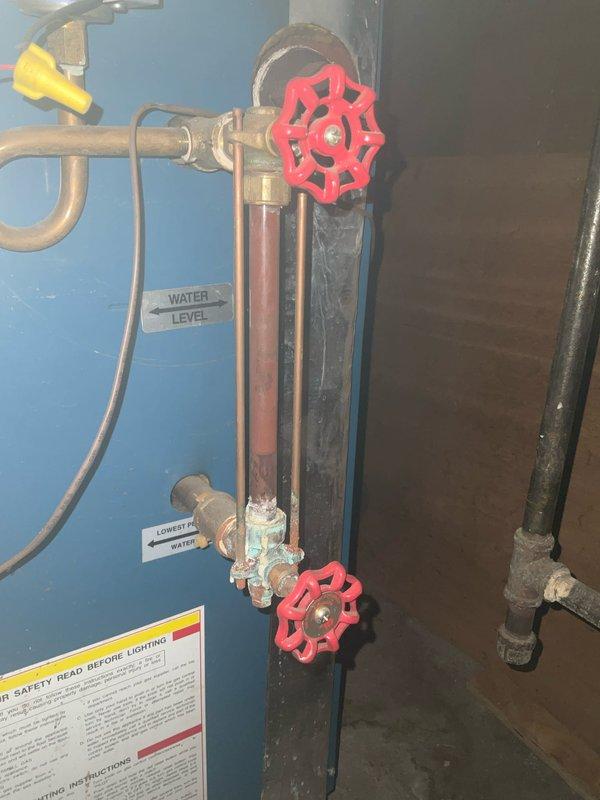 Completed comprehensive boiler tune-up on residential blue tank heating system. Performed standard maintenance procedures including inspection of water level gauge, safety controls, and associated plumbing connections. All components found to be operating within normal parameters, with proper water levels maintained and safety systems functioning correctly.