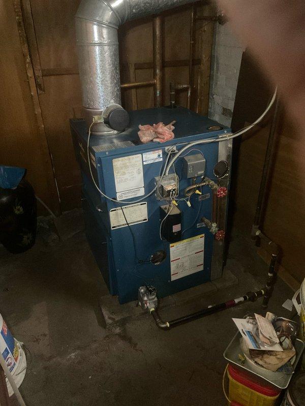 Completed comprehensive boiler tune-up on residential blue tank heating system. Performed standard maintenance procedures including inspection of water level gauge, safety controls, and associated plumbing connections. All components found to be operating within normal parameters, with proper water levels maintained and safety systems functioning correctly.