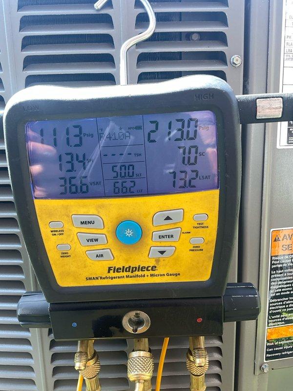 Performed routine maintenance on a 17-year-old Lennox air conditioning system. Completed comprehensive tune-up including system diagnostics using refrigerant manifold gauges to verify operating pressures and temperatures across all refrigerant lines. All measured values were within normal operating parameters, confirming proper system performance and refrigerant charge levels.