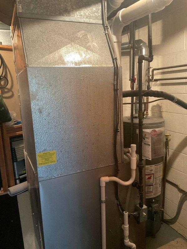 Completed comprehensive annual air conditioning tune-up and system inspection on residential cooling system. Performed standard maintenance protocol including refrigerant pressure testing using digital manifold gauge, verified proper system operation, and inspected indoor air handler unit and outdoor condenser coil condition. All components found operating within normal parameters with no issues identified or repairs required at this time.