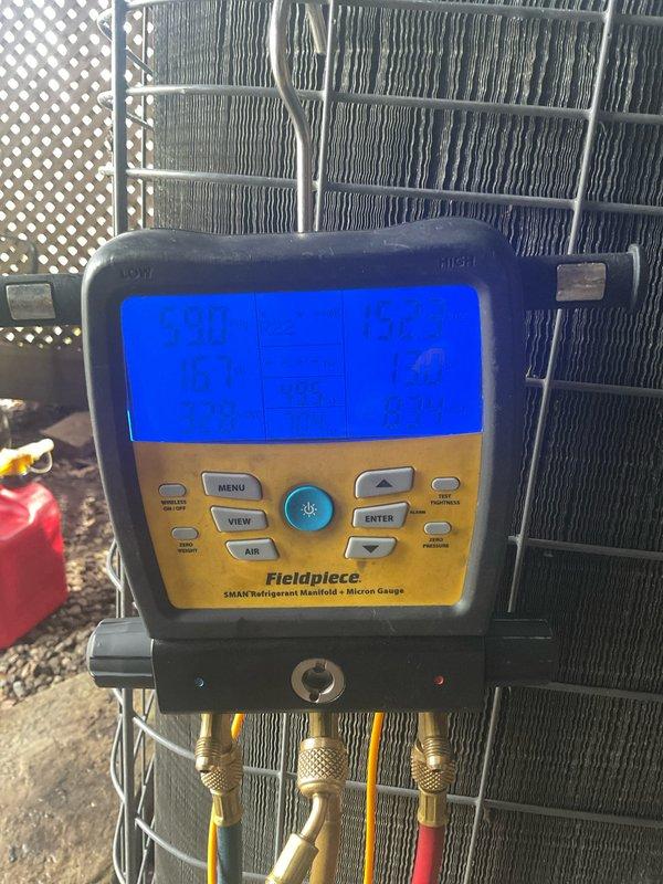 Completed comprehensive annual air conditioning tune-up and system inspection on residential cooling system. Performed standard maintenance protocol including refrigerant pressure testing using digital manifold gauge, verified proper system operation, and inspected indoor air handler unit and outdoor condenser coil condition. All components found operating within normal parameters with no issues identified or repairs required at this time.