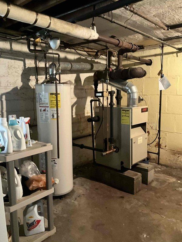 Conducted estimate for steam boiler system with compromised heat exchanger. Inspection revealed hole in heat exchanger requiring replacement, documented condition with photos of boiler unit and associated piping infrastructure. Provided assessment and replacement recommendations to address failed component.