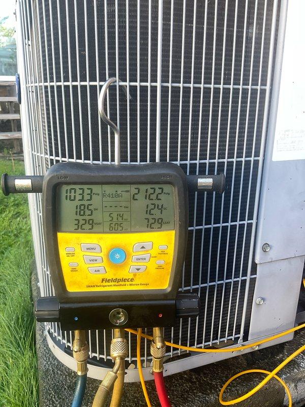Performed comprehensive annual maintenance on an 11-year-old Carrier air conditioning system during first service visit. Conducted full system diagnostics using calibrated manifold gauges to measure refrigerant pressures and temperatures, verified proper system operation, and inspected condenser unit exterior condition including coil fins and protective guards. All components found operating within manufacturer specifications with no deficiencies noted.