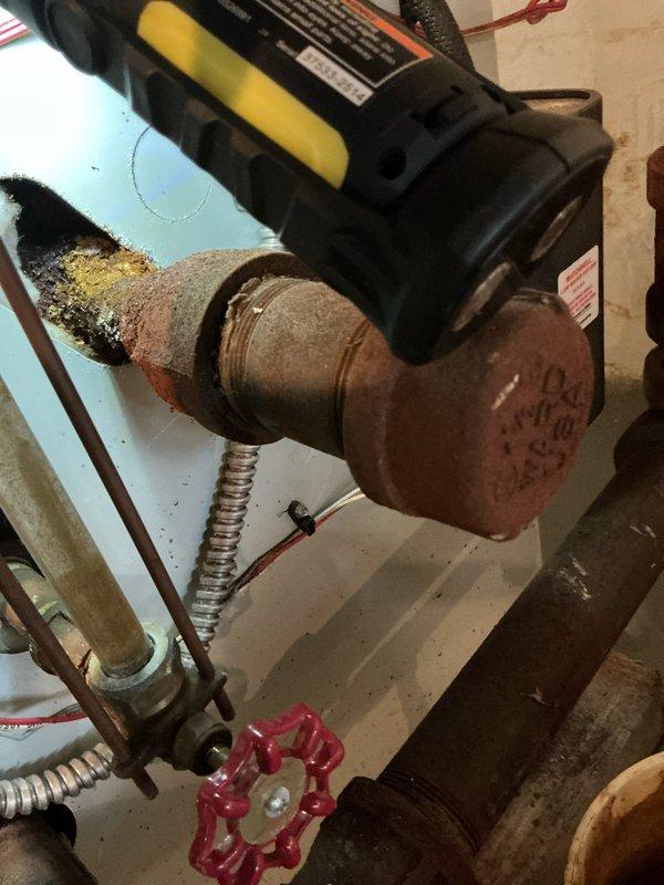 Completed annual maintenance inspection on 12-year-old boiler system. Performed comprehensive system evaluation including visual inspection of heat exchanger, circulator pump, and distribution piping. Inspected finned tube radiator for proper heat distribution and noted age-appropriate surface oxidation with no operational concerns. Examined circulator pump assembly with zone valve controls and verified proper mechanical operation. Observed existing corrosion on copper piping connections and fittings consistent with system age; corrosion is superficial and does not currently affect system integrity or performance. Checked all shut-off valves for proper operation. Verified electrical connections and flex conduit routing to pump motor. System operating within normal parameters for unit age. Recommended monitoring pipe corrosion progression during future service visits. All components functioning as designed with no immediate repairs required.