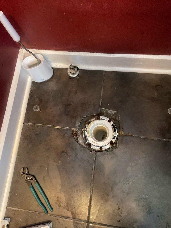 Removed existing toilet from bathroom and prepared flange area for new installation. Installed Gerber Avalanche elongated toilet with new wax seal and supply line, ensuring proper alignment and secure mounting to floor flange. Completed installation with new toilet seat and verified proper flush operation and water supply connection.