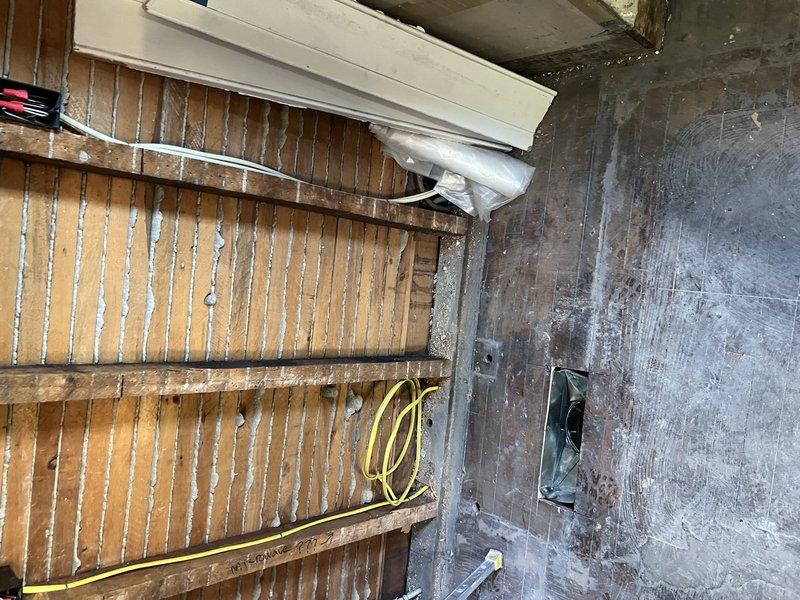 Installed new ductwork run from first floor to second floor bedroom, utilizing existing wall opening in kitchen that was exposed from floor to ceiling. Capped off one side of back-to-back duct configuration to redirect airflow exclusively to the designated bedroom, ensuring proper HVAC distribution to the second floor space.