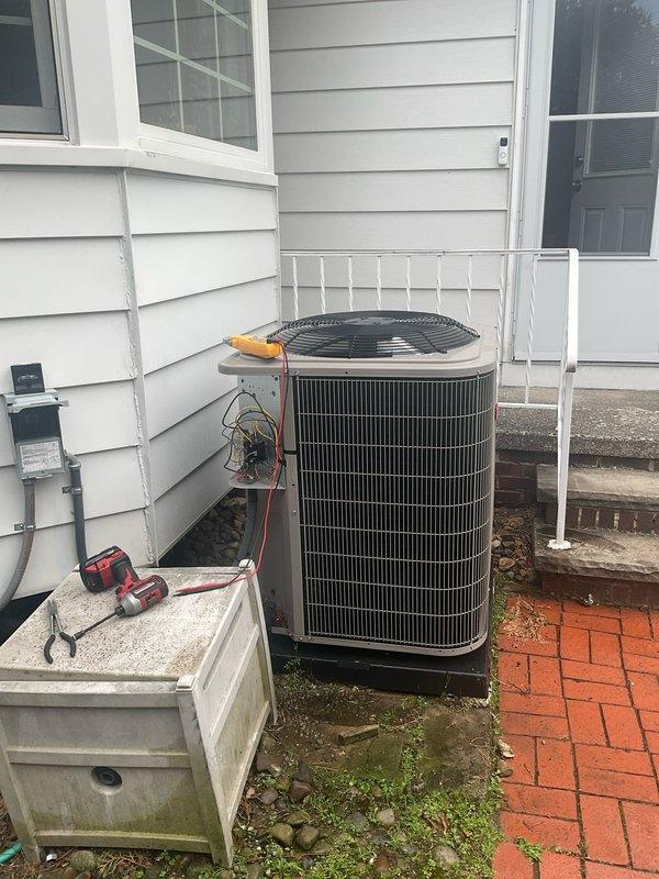 Performed comprehensive AC tune-up on six-year-old cooling system. Conducted full system diagnostics using refrigerant manifold gauge to verify operating pressures and temperatures, inspected outdoor condenser unit including coil condition and fan operation, checked electrical connections and condensate drainage system. All components found operating within normal parameters with no deficiencies noted; system performance confirmed satisfactory.