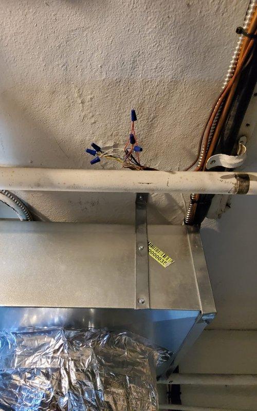 Completed startup and commissioning of newly installed air conditioning system. Verified proper installation of indoor air handler unit in attic space with appropriate mounting, drainage piping, refrigerant line connections, and electrical wiring terminations. Confirmed outdoor condenser units are properly positioned with adequate clearance, secure electrical connections, and refrigerant line sets properly insulated and routed through exterior wall penetrations. System tested and operational.