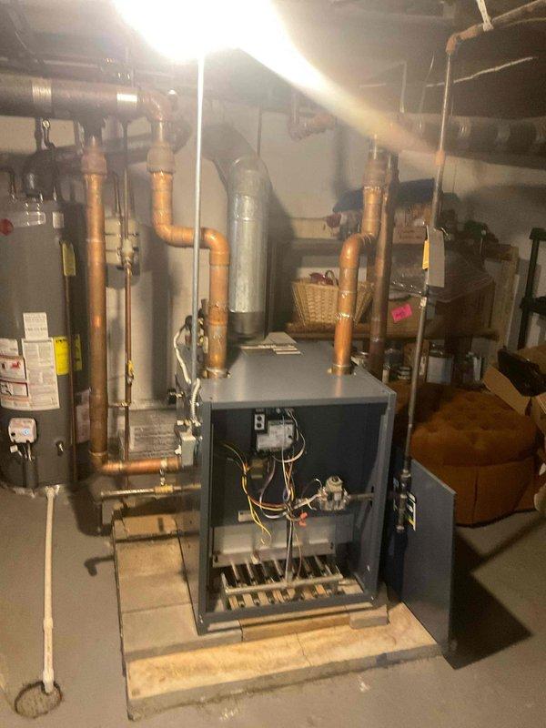 Completed annual tune-up on residential boiler system. Performed comprehensive inspection of boiler unit, copper piping network, expansion tank, and all associated components. Cleaned and tested burner assembly, verified proper combustion, checked all safety controls and pressure relief valves. Inspected extensive copper distribution piping for leaks or corrosion, confirmed all connections secure. Tested system operation under load, verified proper temperature rise and circulation. All components functioning within normal parameters at time of service.