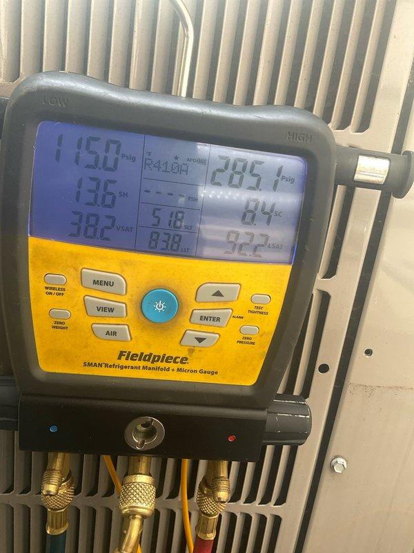 Performed comprehensive tune-up on 3-year-old Bryant central air conditioning system. Connected manifold gauges and recorded system pressures and temperatures, verifying proper refrigerant charge and operational parameters across both low and high-side pressures. Inspected outdoor condenser unit, confirmed proper airflow through coils, and verified all electrical connections and components functioning within normal specifications.