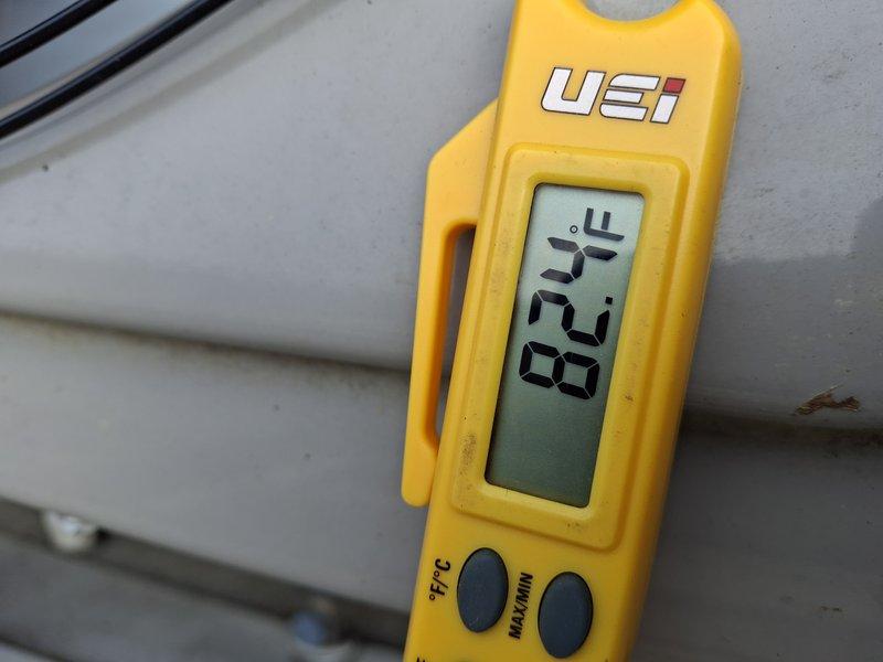 Completed startup and commissioning of newly installed 4-ton air conditioning system. Verified proper system operation by measuring supply air temperature at 82.9°F and confirming electrical parameters including amperage draw of 26.9A at 128.2V, all within manufacturer specifications for optimal performance.