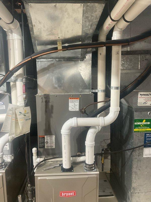 Completed comprehensive cooling system tune-up on 10-year-old Bryant AC unit. Performed full system diagnostics using refrigerant manifold gauges, recording operating pressures, temperatures, superheat (40.5°F), and subcooling (76.6°F) values to verify proper refrigerant charge and system performance. Inspected condensate drainage lines, refrigerant line insulation, ductwork connections, and all electrical components. System found operating within manufacturer specifications with no deficiencies noted.