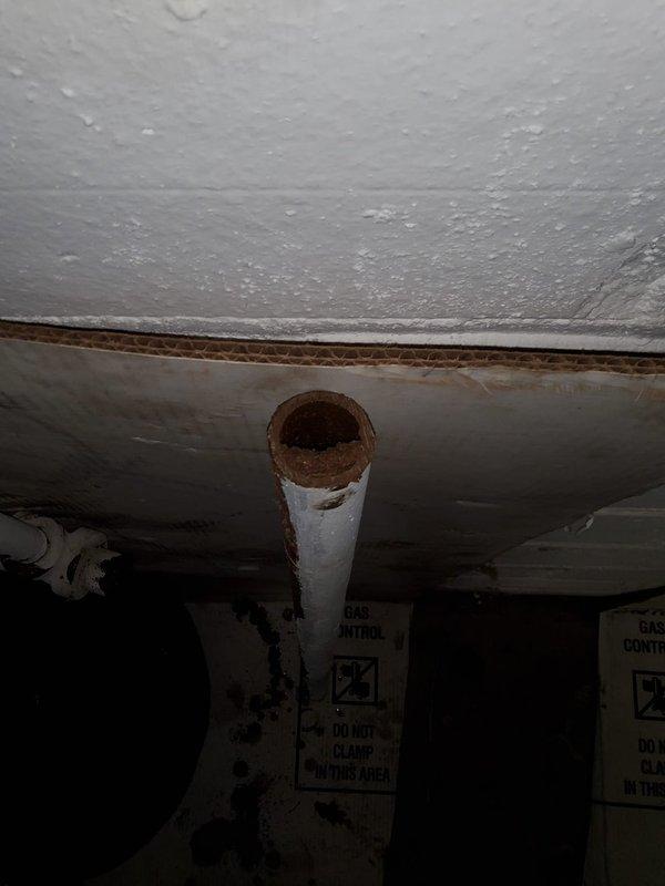 Installed approximately 118 feet of copper return lines with proper copper strapping support throughout the property. Routed piping in front of drywall in the back closet area under the stairs to eliminate the need for demolition work. Coordinated workspace preparation with clearance requirements while allowing washer and dryer to remain in position during installation.