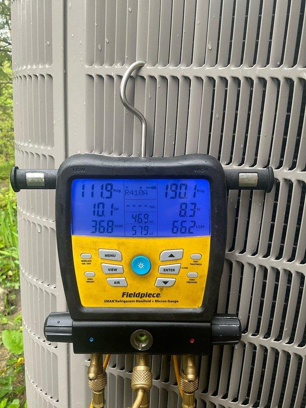 Completed preventive maintenance on Bryant residential cooling system per customer's request for first available appointment. Performed comprehensive system diagnostics using Fieldpiece SMAN digital manifold with micron gauge to verify refrigerant pressures, temperatures, and system performance parameters. Outdoor condenser unit inspected and found operational with fan motor and compressor functioning within normal specifications. All electrical connections at disconnect box verified secure, refrigerant lines inspected for leaks or damage, and coil fins checked for condition. System operating properly with no deficiencies noted at time of service.