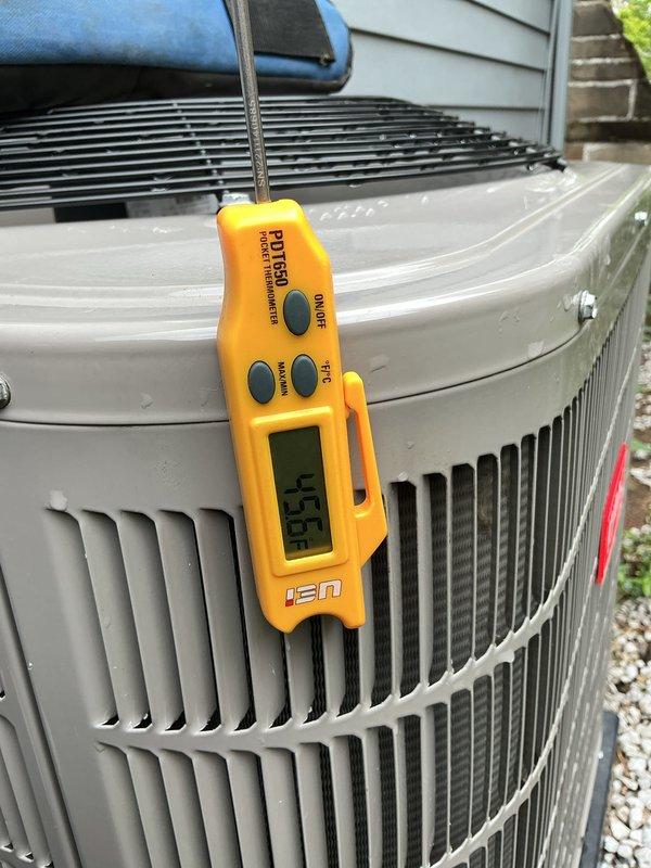 Completed spring maintenance tune-up on a 3-year-old residential air conditioning system. Performed comprehensive inspection of outdoor condenser unit, verified refrigerant temperatures reading 49.5°F at the unit, checked indoor air return grille and ductwork access, and confirmed all components operating within normal parameters. System is functioning properly with no issues identified during the preventative maintenance service.