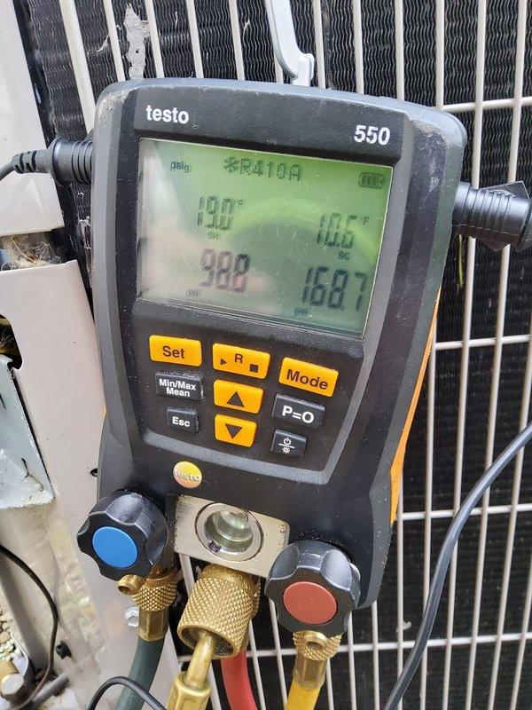 Performed annual cooling system maintenance and tune-up on a 16-year-old air conditioning unit as part of the preventative maintenance plan. Conducted comprehensive system inspection including refrigerant pressure and temperature diagnostics using calibrated manifold gauges, recording superheat and subcooling measurements to verify proper system charge and operation. Measured supply air temperature at 52°F, confirming adequate cooling performance. Inspected condenser coil condition and verified proper heat exchange operation. System operating within normal parameters with no deficiencies noted at time of service.
