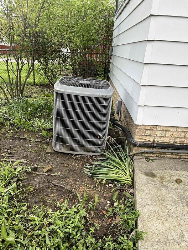 Conducted on-site evaluation for complete HVAC system replacement at residential property with 26-year-old existing equipment. Assessed current basement-mounted furnace installation with associated ductwork configuration and outdoor condensing unit positioned on concrete pad against exterior foundation. Documented existing system components, mechanical room layout, and outdoor unit placement for replacement specifications and equipment sizing recommendations.