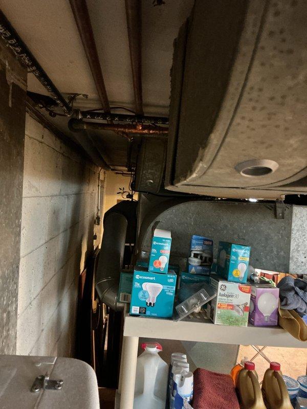 Conducted comprehensive assessment of existing York furnace and air conditioning system for equipment replacement estimate. Documented current HVAC installation including furnace unit, ductwork configuration, electrical components, and PVC venting system in basement utility area. Evaluated equipment condition, system layout, and spatial considerations to provide accurate replacement recommendations and specifications.