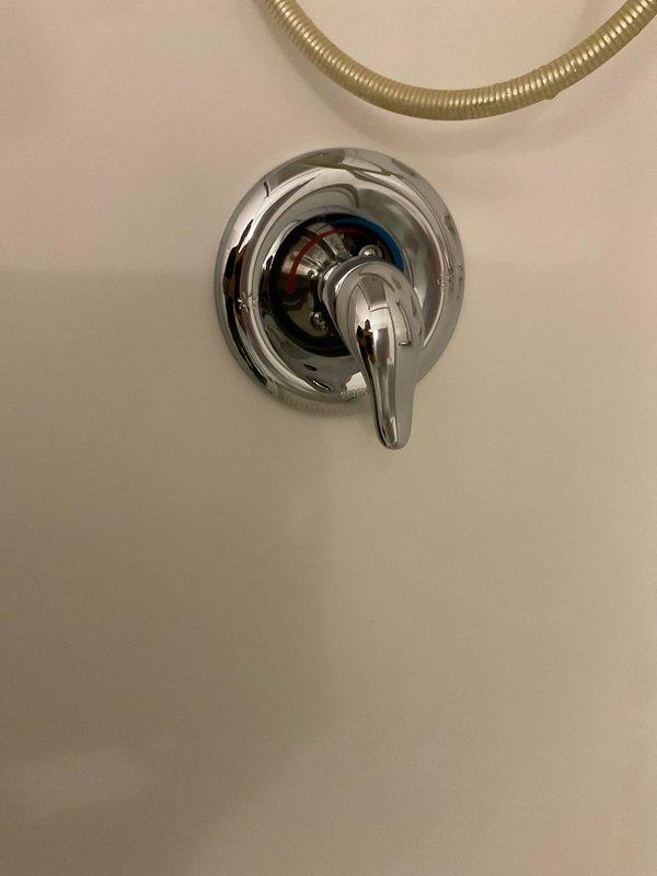 Installed a Moen Posi-Temp pressure-balancing valve and trim kit in brushed nickel finish for shower-only application. Opened and repaired a section of drywall to access existing copper supply lines for proper valve installation. Completed full installation with all components tested and operational.