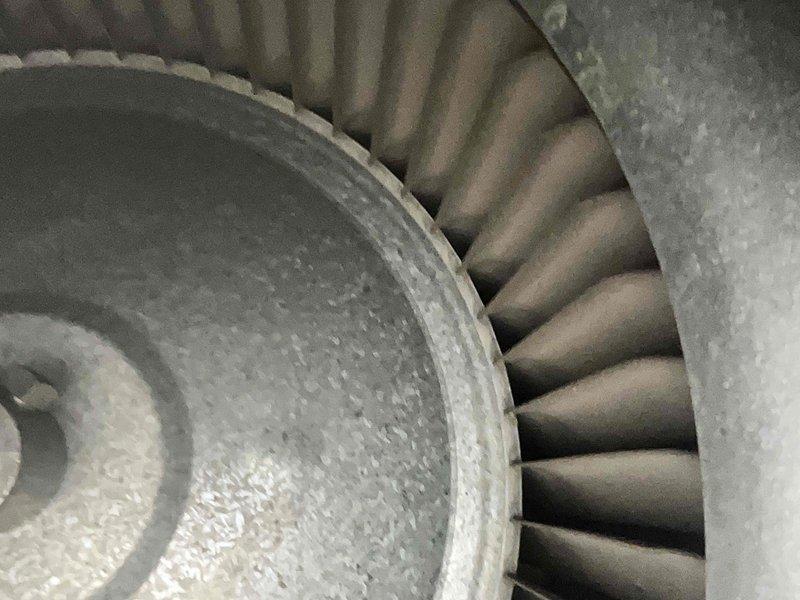 Performed comprehensive preventive maintenance on an 11-year-old Goodman outdoor condensing unit, model W1AC06SA181A. System was operational with no reported issues at time of service. Completed full tune-up inspection including visual assessment of electrical components, verification of manufacturer specifications, and examination of blower wheel assembly. Noted moderate dust and debris accumulation on blower wheel blades and housing, consistent with normal operation over extended service interval. All electrical specifications confirmed per nameplate data: 208-230V, 1PH, 60HZ operation. Unit remains in serviceable condition for continued operation.