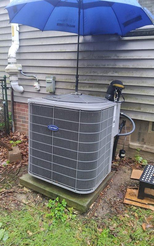 Completed comprehensive air conditioning tune-up on Carrier condensing unit per maintenance agreement. System operational with no deficiencies noted during inspection. All electrical connections, refrigerant lines, and condensate drainage verified functioning properly.
