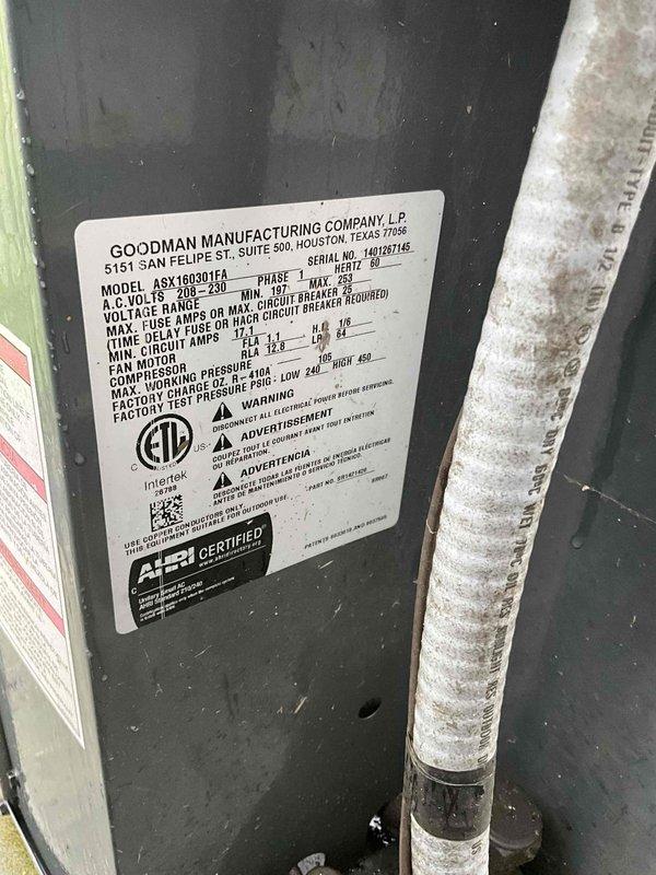 Conducted on-site assessment for HVAC system replacement. Documented existing Goodman ASXE16030TF4 air handler unit specifications, including electrical ratings of 208-230V and relevant model information for replacement planning. Evaluated current basement installation configuration, including existing ductwork connections, supply plenums, and insulated refrigerant lines. Photographed equipment labels and mechanical room layout to provide comprehensive documentation for preparing replacement estimate and ensuring proper equipment sizing for the application.