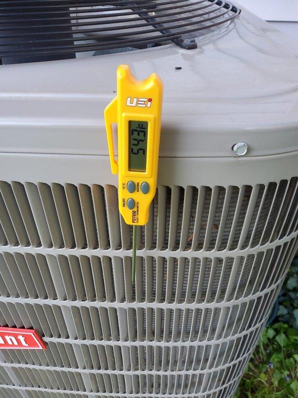 Completed air conditioning tune-up and performance evaluation. Verified system operating pressures and temperatures using digital manifold gauges, confirming R-410A refrigerant charge at 95.9 psi suction and 182.0 psi discharge with coil temperatures of 95°F and 122°F. Measured superheat at 50.5°F, indicating proper refrigerant charge and system efficiency.