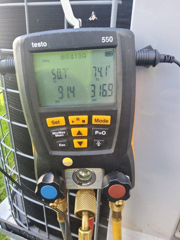 # HVAC Maintenance Service Completed

Performed comprehensive air conditioning maintenance on a cooling system under the MVP prepaid maintenance plan. Conducted thorough system inspection and diagnostics using Testo 550 digital manifold gauges to measure refrigerant pressures and temperatures on the R-410A system.

Recorded operating pressures and temperatures at the outdoor condensing unit, with suction and discharge readings confirming proper refrigerant charge and system performance. Verified superheat and subcooling values were within manufacturer specifications. Inspected condenser coil fins, electrical connections, and refrigerant lines for any signs of wear or damage. System is operating efficiently and ready for continued cooling season operation.