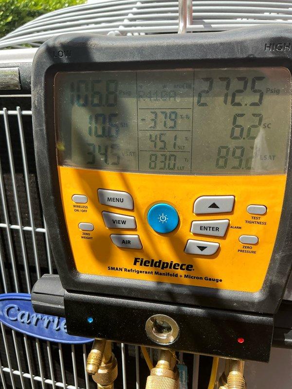 Completed annual air conditioning maintenance on Carrier cooling system. Performed comprehensive AC tune-up including refrigerant pressure and temperature diagnostics using manifold gauge, recording subcooling at 6.2°F and superheat measurements within acceptable parameters. Inspected and verified operation of whole-house UV air purifier system. All components operating normally with no deficiencies noted.
