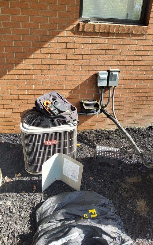 Performed scheduled maintenance tune-up on residential Bryant air conditioning system. Completed comprehensive inspection of condenser unit, checked refrigerant levels, examined electrical connections at disconnect box, and verified proper operation of all components. Unit tested and confirmed operating within normal parameters upon completion.