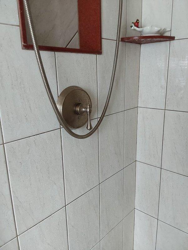 Responded to service call for shower lacking hot water in 90-year-old home. Diagnosed and replaced faulty Kohler shower valve cartridge and trim components, restoring proper hot water function to shower fixture. Performed routine inspection of sump pump system with no issues found. Completed annual backflow prevention assembly test on sprinkler system per code requirements, with device testing within acceptable parameters.