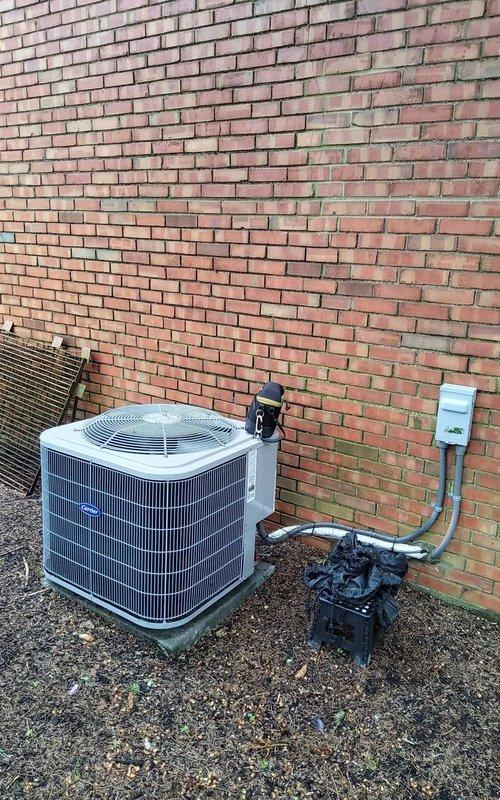 Completed scheduled preventive maintenance on 5-year-old Carrier air conditioning system. Performed comprehensive AC tune-up including inspection of outdoor condensing unit, compressor assembly, and electrical disconnect. Verified all refrigerant lines, conduit connections, and mounting hardware secure and properly installed. System operating within normal parameters with no deficiencies noted.