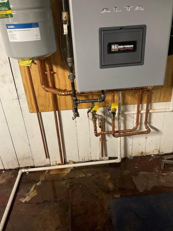 Installed pressure relief valves on hydronic boiler system. Replaced PRVs on copper piping network connected to U.S. Boiler Company heating unit, ensuring proper safety valve operation and system pressure regulation. Work included integration with existing expansion tank and ball valve configuration in the heating distribution system.