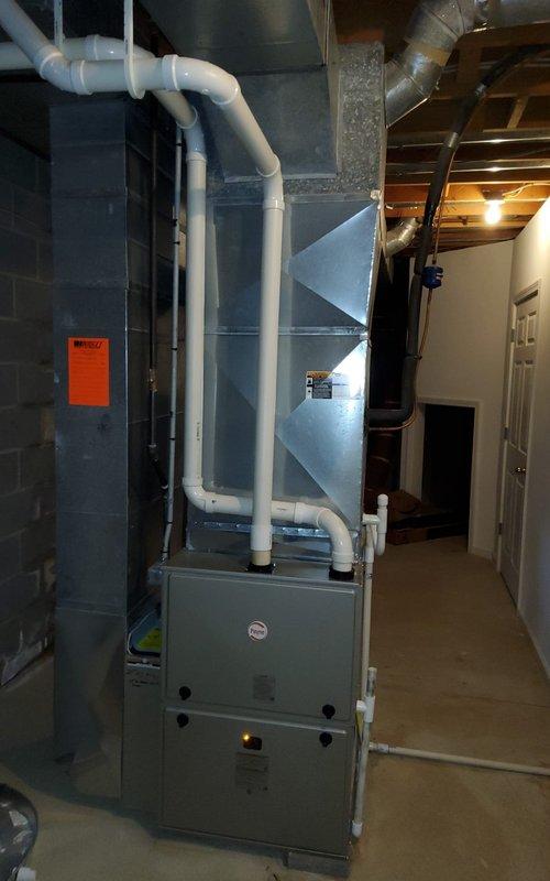 Completed comprehensive air conditioning tune-up on residential split system with outdoor condensing unit and indoor air handler. Performed full system inspection including visual assessment of both indoor and outdoor components, verified proper operation of condenser fan and compressor, checked refrigerant lines and electrical connections, and confirmed adequate airflow through evaporator coil. System found to be operating within normal parameters with no immediate service needs identified.
