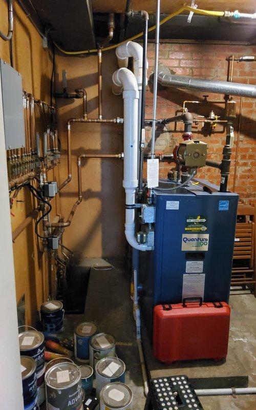 Completed heating tune-ups on multiple heat pump systems in a residential property with radiant heating distribution and boiler components. Performed comprehensive maintenance inspections, verified proper operation of all heating equipment including the Quantum boiler unit, checked PVC exhaust venting systems, and confirmed all manifold connections and pressure readings were within normal parameters.