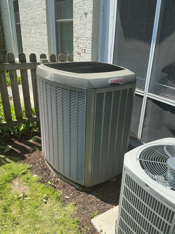 Completed estimate for replacement of existing two-system HVAC setup. Assessed current basement installation featuring Lennox furnace with PVC venting and auxiliary equipment including water heater and filter housing. Evaluated outdoor equipment including Lennox air conditioning unit and secondary AC system positioned on gravel pad against building exterior. Documented existing equipment condition, installation configuration, and replacement requirements for dual-zone cooling system upgrade.