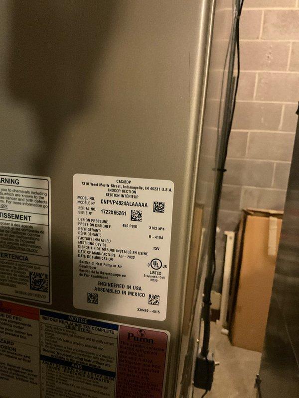 Completed annual preventative maintenance on a 3-year-old Carrier air conditioning system utilizing R-410A refrigerant. Performed comprehensive system inspection including visual examination of indoor air handler unit, verified manufacturer specifications and equipment labeling integrity. Conducted refrigerant system diagnostics using Fieldpiece SMAN manifold gauge, measuring operating pressures at 110.5 PSI suction and 110.8 PSI discharge, with superheat reading of 53.1°F and subcool at 5.18°F. All system parameters found within normal operating range. Unit operating efficiently with no deficiencies noted. System ready for continued service through cooling season.