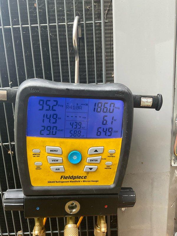 Completed comprehensive AC tune-up on 9-year-old residential cooling system. Performed standard maintenance protocol including refrigerant pressure and temperature diagnostics using digital manifold gauges, confirming system operating within manufacturer specifications at 95.2 PSI suction and proper superheat/subcooling values. Inspected condenser unit exterior components, coil condition, and refrigerant lines for wear or damage. System found to be operating efficiently with no deficiencies noted at time of service.