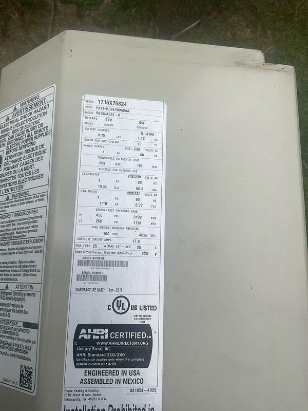 Completed routine air conditioning tune-up on Carrier split system with no reported issues. Performed comprehensive maintenance inspection of indoor air handler unit and outdoor condensing unit, verified all electrical connections and specifications per manufacturer nameplate (Model 1718X76824, 208-230V), checked refrigerant pressures, and confirmed system operational status. All components found operating within normal parameters.