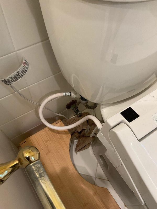 Responded to service call for toilet replacement evaluation. Upon arrival, inspected existing toilet with electronic bidet seat attachment and identified customer's request for replacement quote. Documented current installation including bidet functionality, water supply connections, shut-off valve condition, and floor mounting configuration. Assessed plumbing infrastructure behind fixture, noting flexible supply line connections to wall-mounted brass shut-off valves and existing floor conditions for potential replacement work. Photographed installation details to provide accurate replacement estimate including bidet seat considerations and any necessary plumbing modifications.